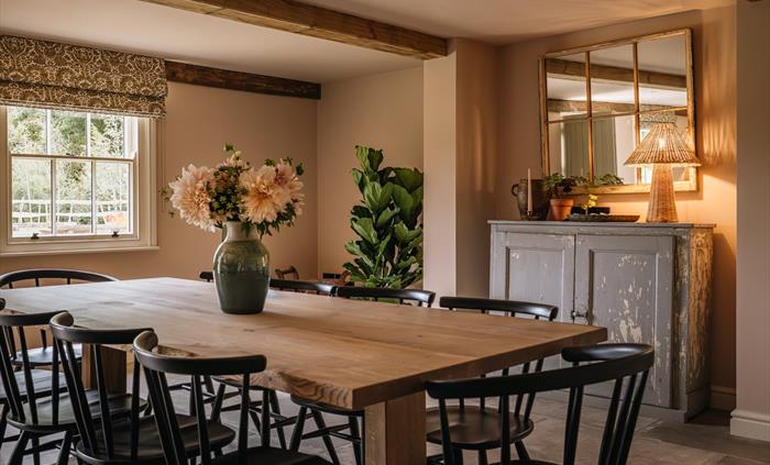 A dining table with chairs
